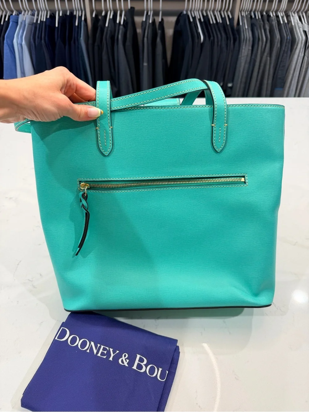 Dooney & Bourke Turquoise Tote with Tassel Charm